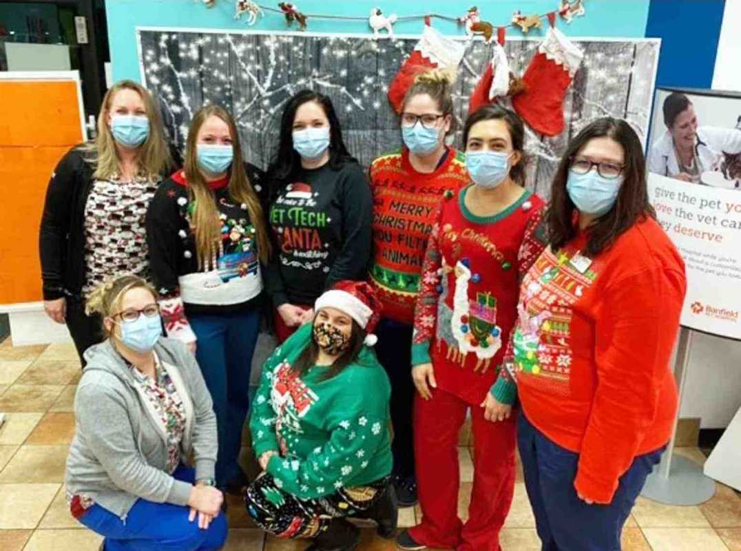 A group of Banfield Associates celebrating Christmas at the Banfield Pet Hospital